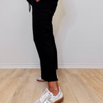 Women wearing Liverpool wide leg crop pant in black.