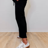 Women wearing Liverpool wide leg crop pant in black.