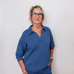 Liverpool V-neck popover collar sweatshirt in pacific blue on female model with white background
