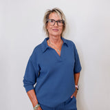 Liverpool V-neck popover collar sweatshirt in pacific blue on female model with white background