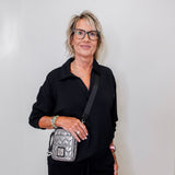 women modeling a black v neck sweatshirt in black