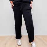 Women wearing Liverpool wide leg crop pant in black.
