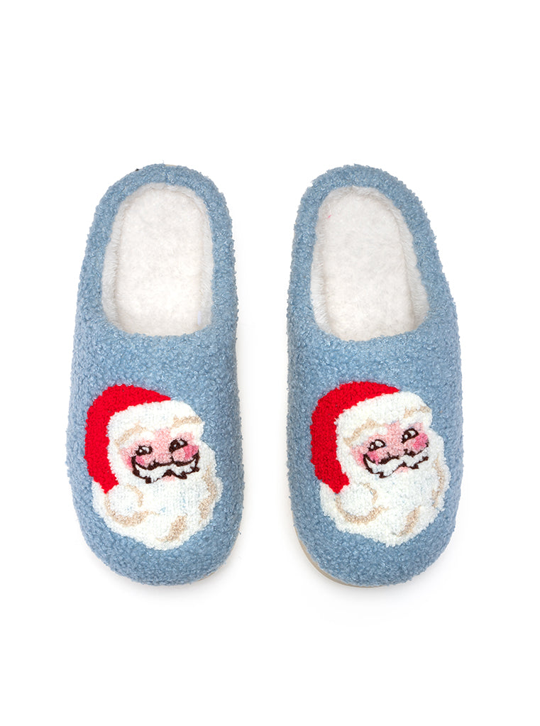 Pair of blue slippers with Santa Claus face design on a white background