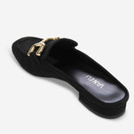 Black loafer with gold chain detail on a white background