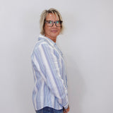 front view of the long sleeve lace up striped top by karen kane