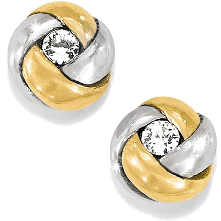 Pair of gold and silver earrings with clear gemstones on a white background