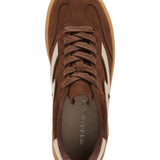 Brown sneaker with white accents on a white background