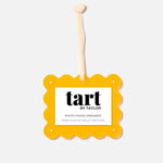 Yellow photo frame ornament with 'tart by Taylor' branding on a white background
