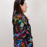 woman wearing a johnny was margot silvana blouse with bold boho paisley design