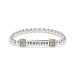 Silver beaded bracelet with a gold and silver cylindrical charm displaying the word 'Fearless' on a white background.