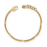 Gold bracelet with intricate design on a white background