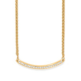 Gold necklace with a curved chain and small diamonds on a white background