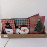 Set of gift card holders with decorative designs in a box on a white surface.