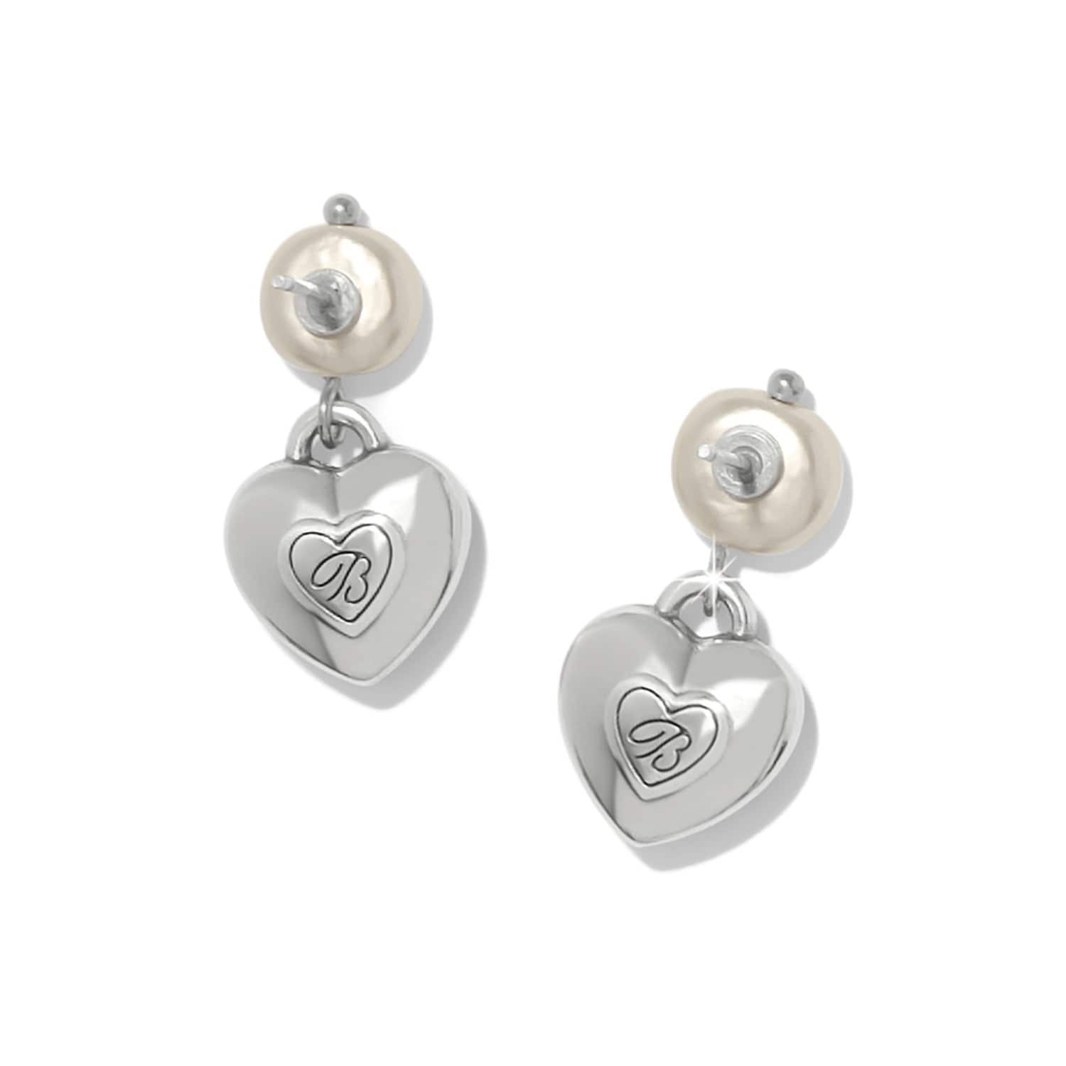Silver heart-shaped earrings with pearl accents on a white background