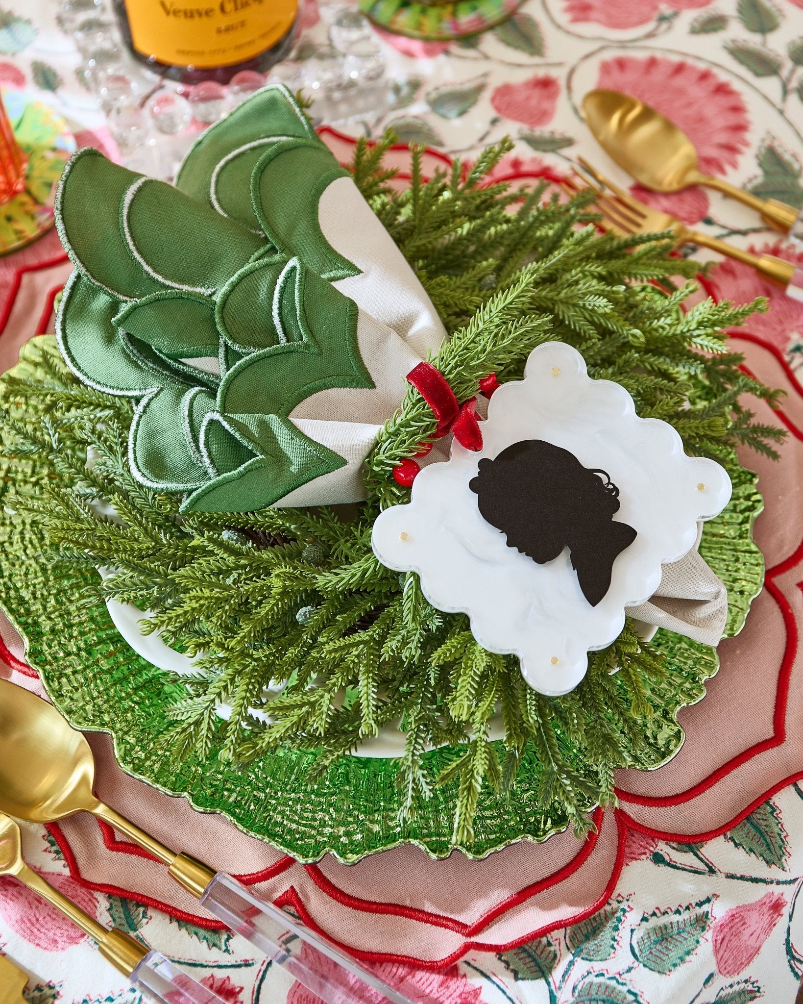 Decorative wreath with silhouette on a patterned tablecloth