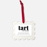 Decorative photo frame ornament with red candle on a white background, branded 'tart by Taylor'.