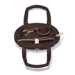 Brown bag with interior compartments on a white background