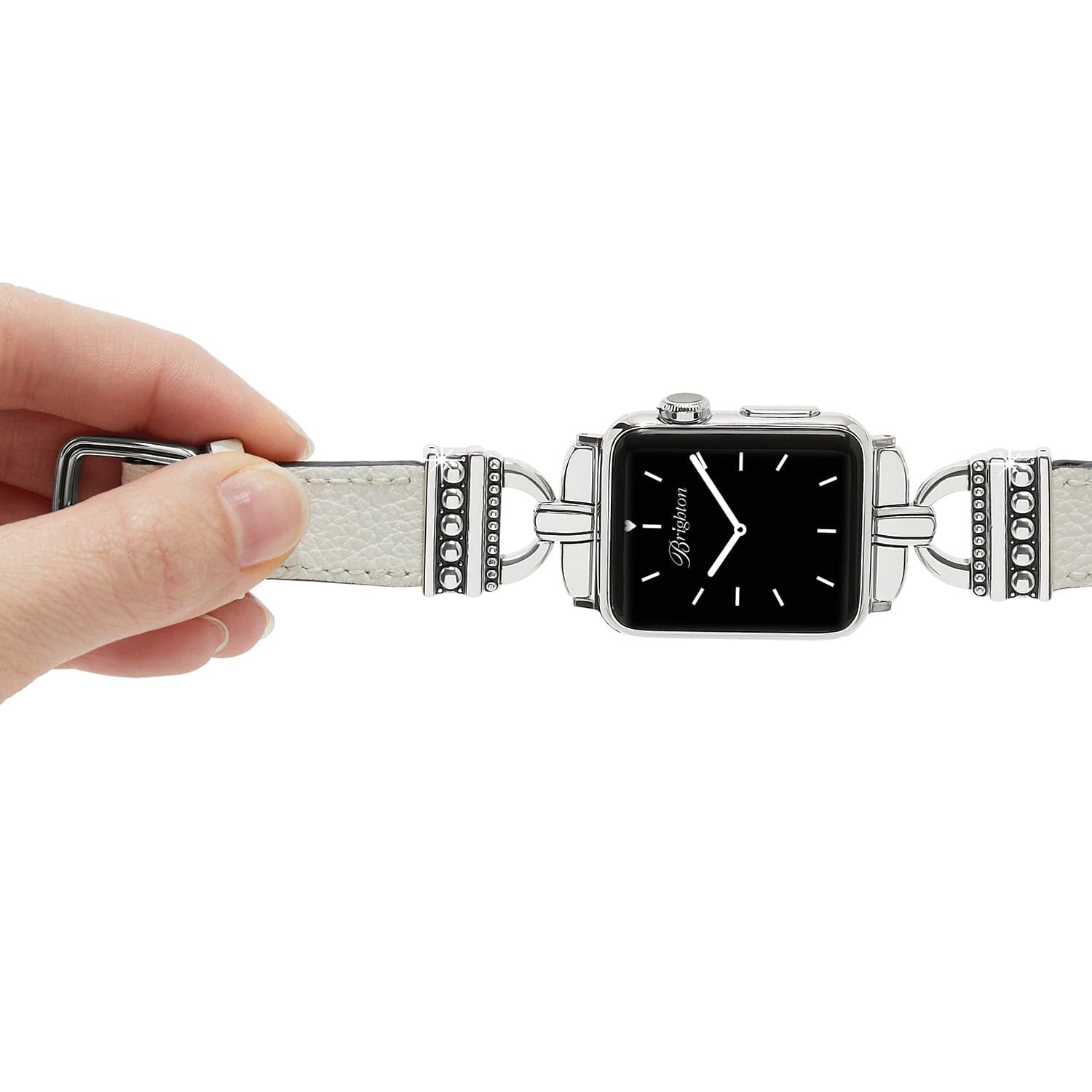 Smartwatch with decorative band held by a hand on a white background
