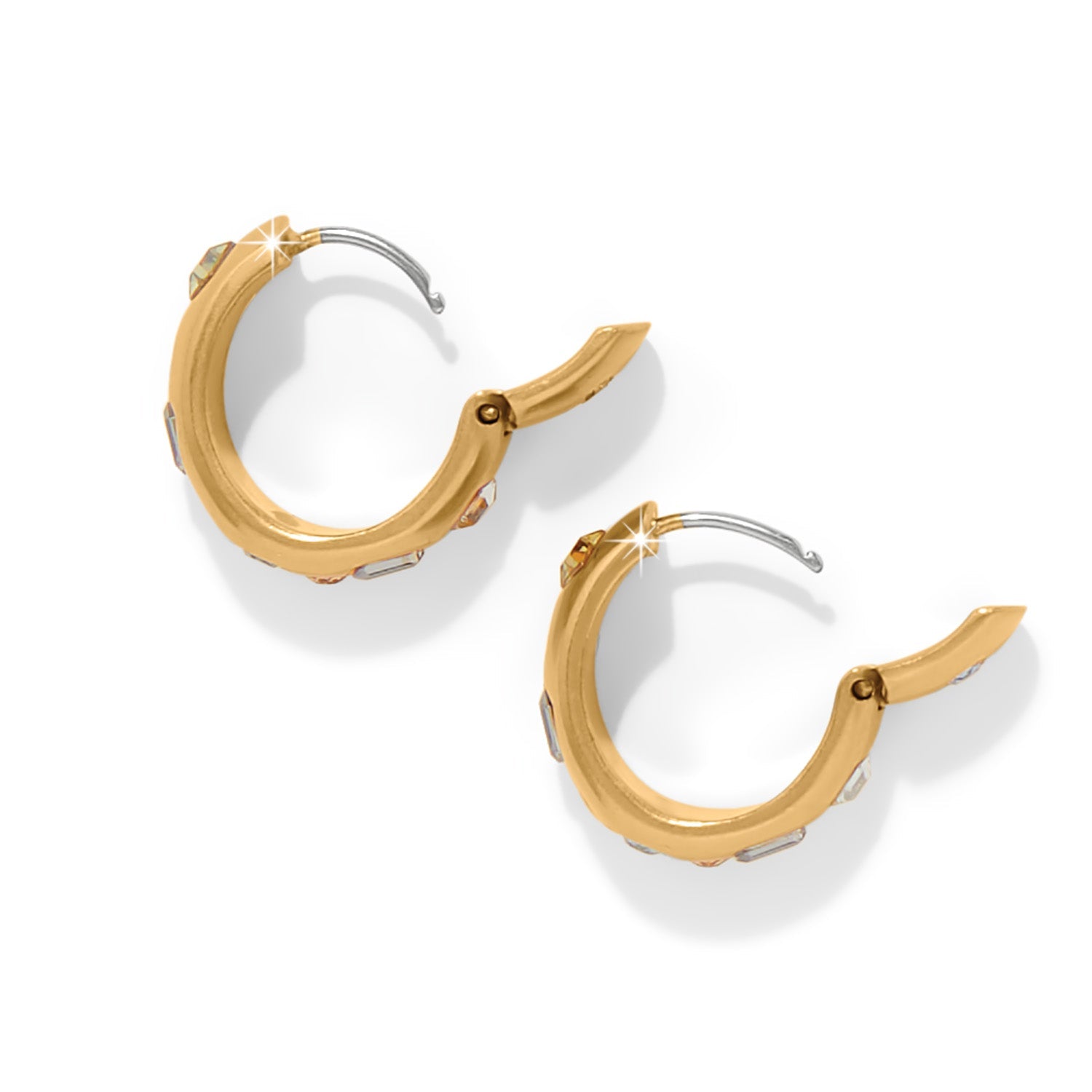 Gold hoop earrings on a white background