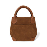Brown handbag with braided handle on a white background