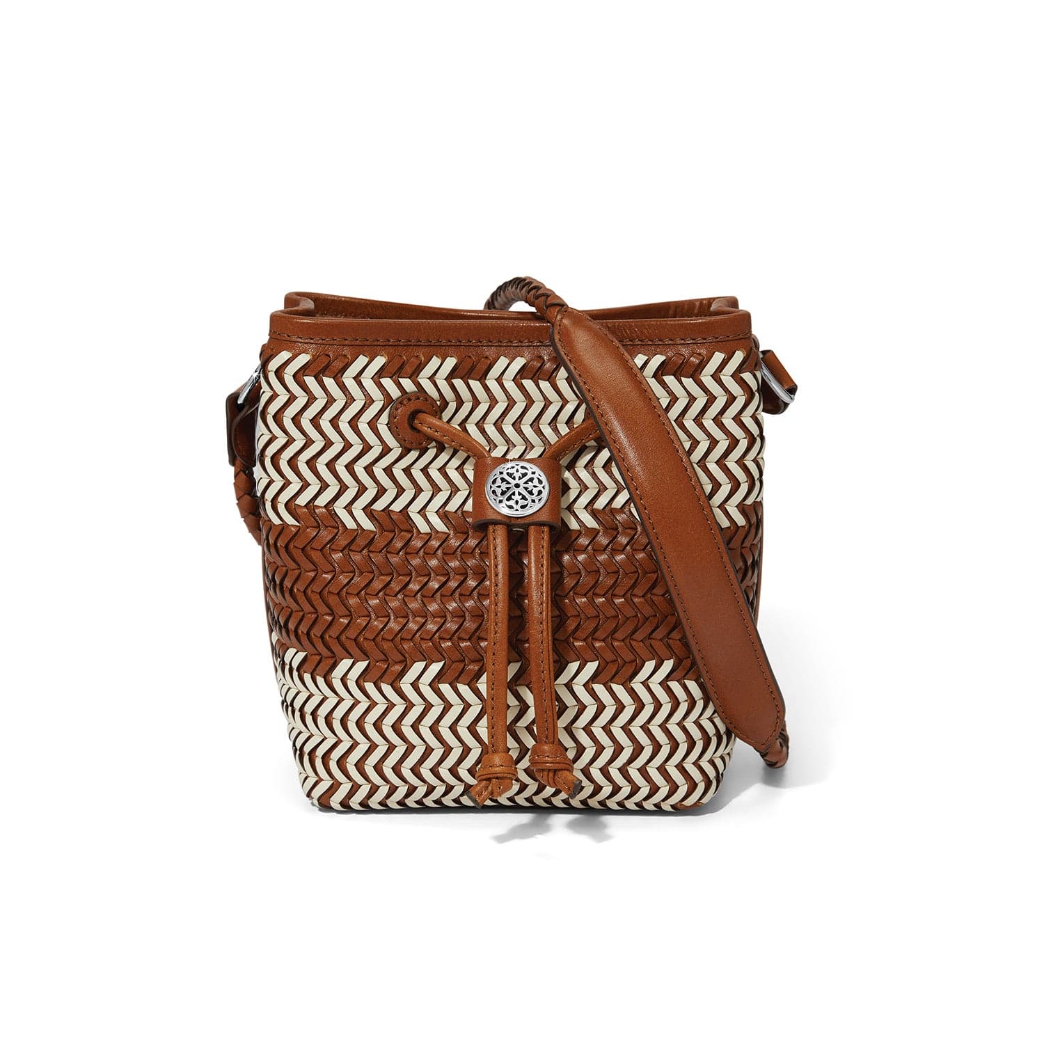 Woven handbag with brown leather accents on a white background