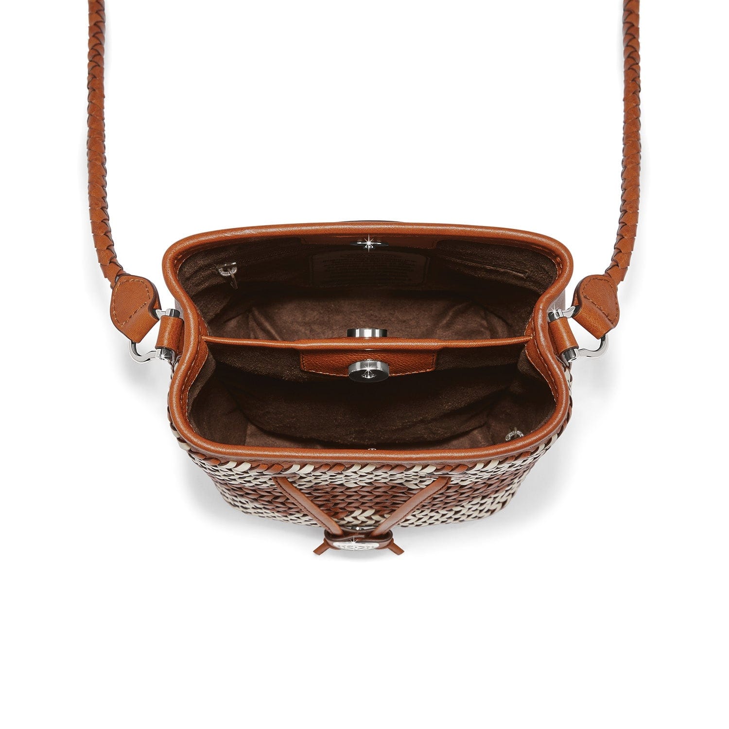 Brown leather handbag with patterned base on a white background
