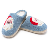 Pair of blue slippers with Santa Claus design on a white background