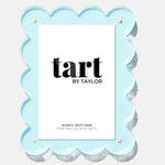 Light blue scalloped photo frame with 'tart by Taylor' branding on a white background