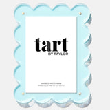 Light blue scalloped photo frame with 'tart by Taylor' branding on a white background