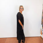 helen silk kaftan long dress in black featuring lightweight sheer fabric worn by model