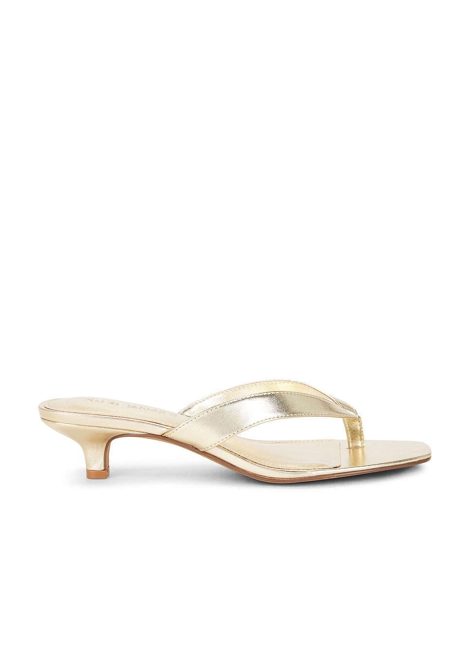 Gold high-heeled sandal on a white background