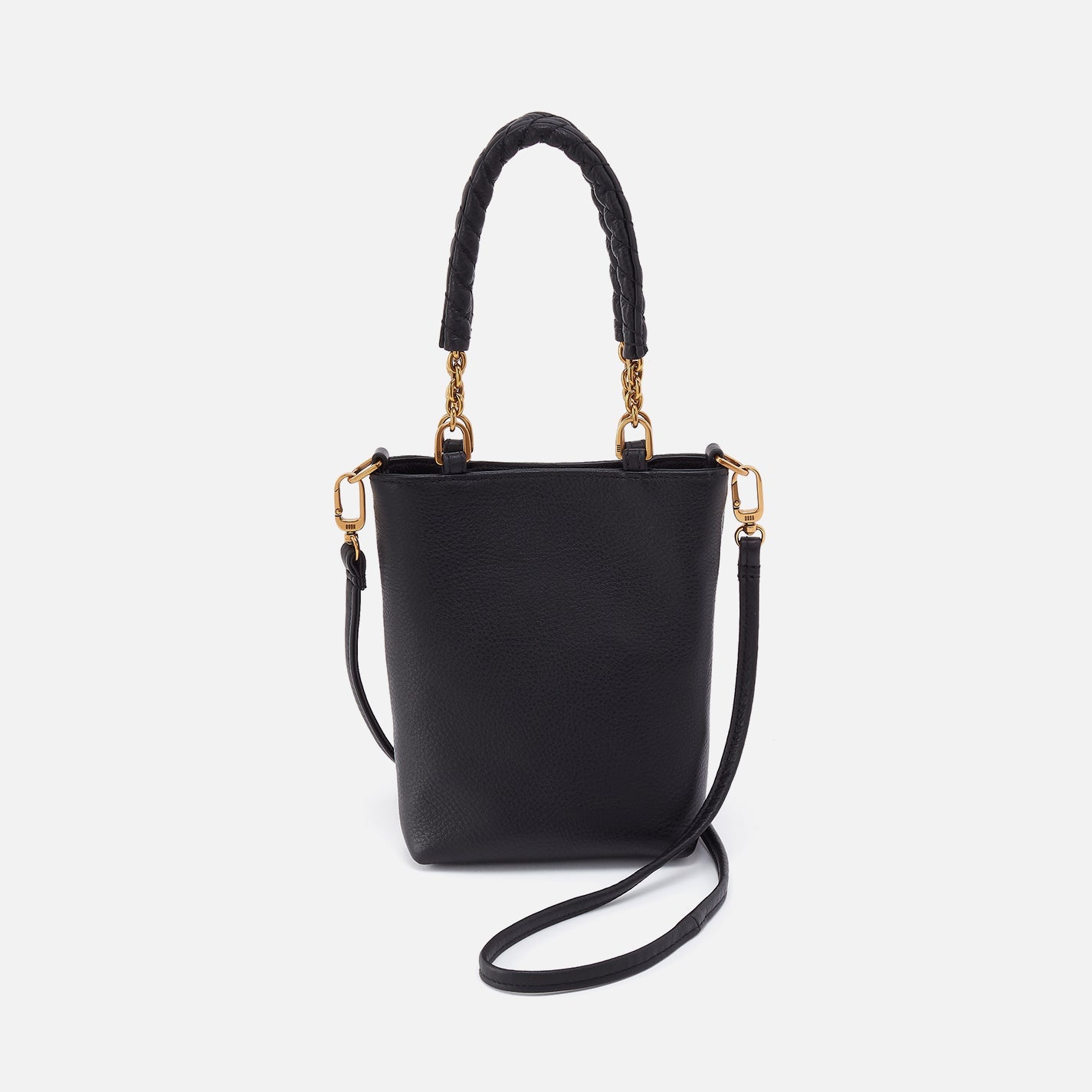 Black handbag with gold accents on a white background