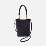 Black handbag with gold accents on a white background