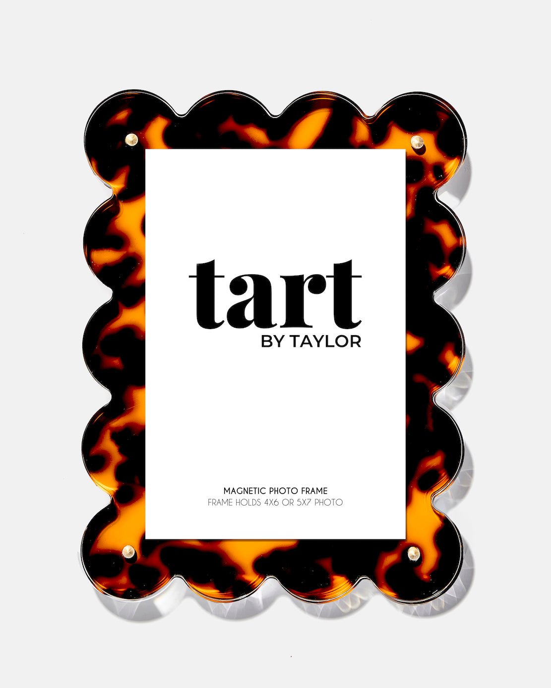 Tortoiseshell magnetic photo frame with 'tart by Taylor' branding on a white background