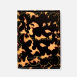 Tortoiseshell patterned product packaging with 'Tart & Taylor' branding on a white background