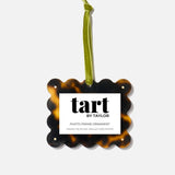 Tortoiseshell photo frame ornament with 'tart by Taylor' label on a white background