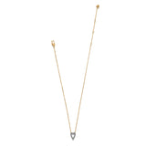 Gold necklace with a heart-shaped pendant on a white background