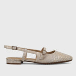Beige sandal with a strap on a light gray background