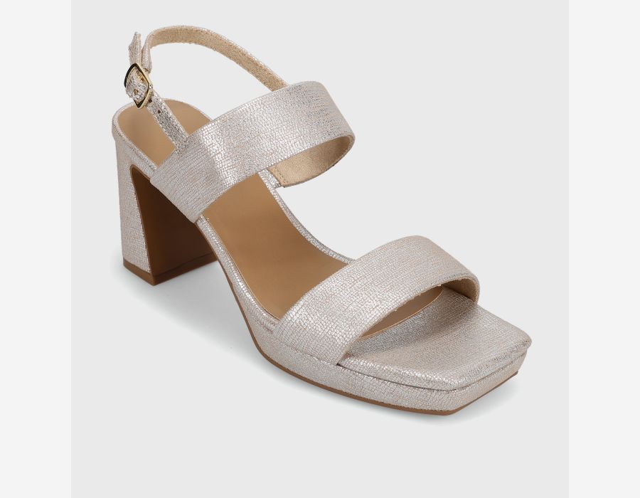 Silver high-heeled sandal on a light gray background