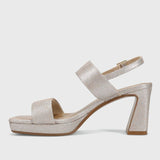 Silver glitter high-heeled sandal on a white background