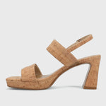 Cork sandal with a block heel on a light gray background