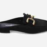 Black slip-on shoe with gold buckle detail on a white background