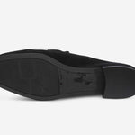 Black shoe sole on a white background
