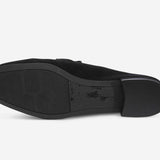Black shoe sole on a white background