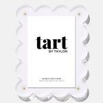 White scalloped photo frame with 'tart by Taylor' branding on a white background