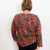 woman wearing a rib paisley everyday tee against a white background. 