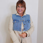 woman wearing a denim trench coat 