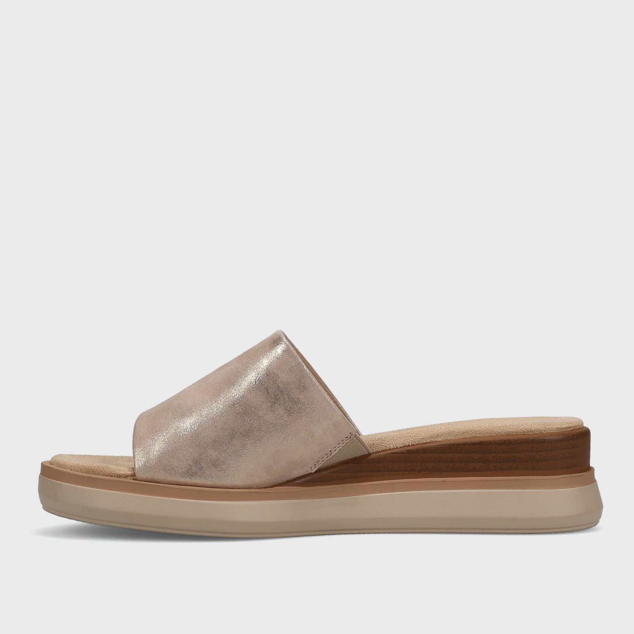 Metallic sandal with a brown sole on a light gray background