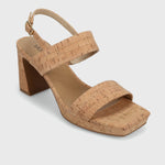 Cork sandal with block heel on a light gray background