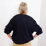woman wearing a black sweatshirt